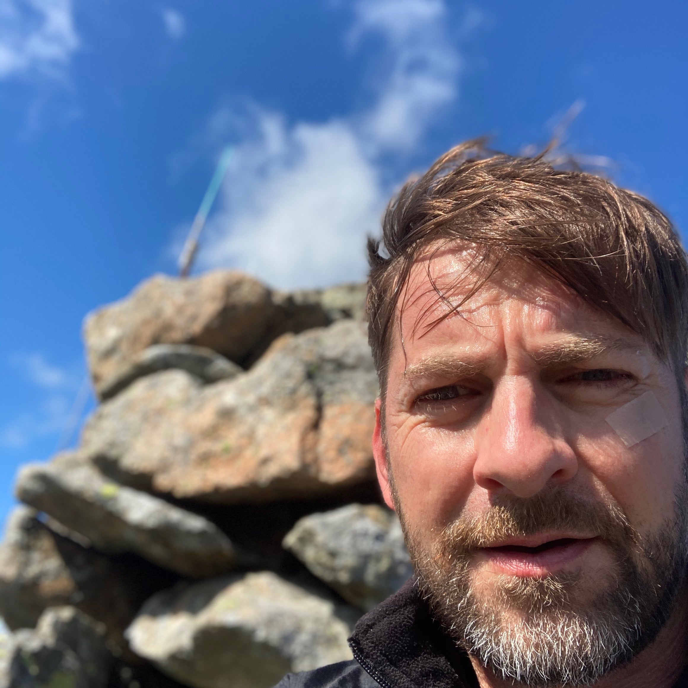 Atle Egenes in front of rocks with blue skies