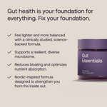 Purple supplement jar labeled 'Gut Essentials' with text about gut health on a beige background