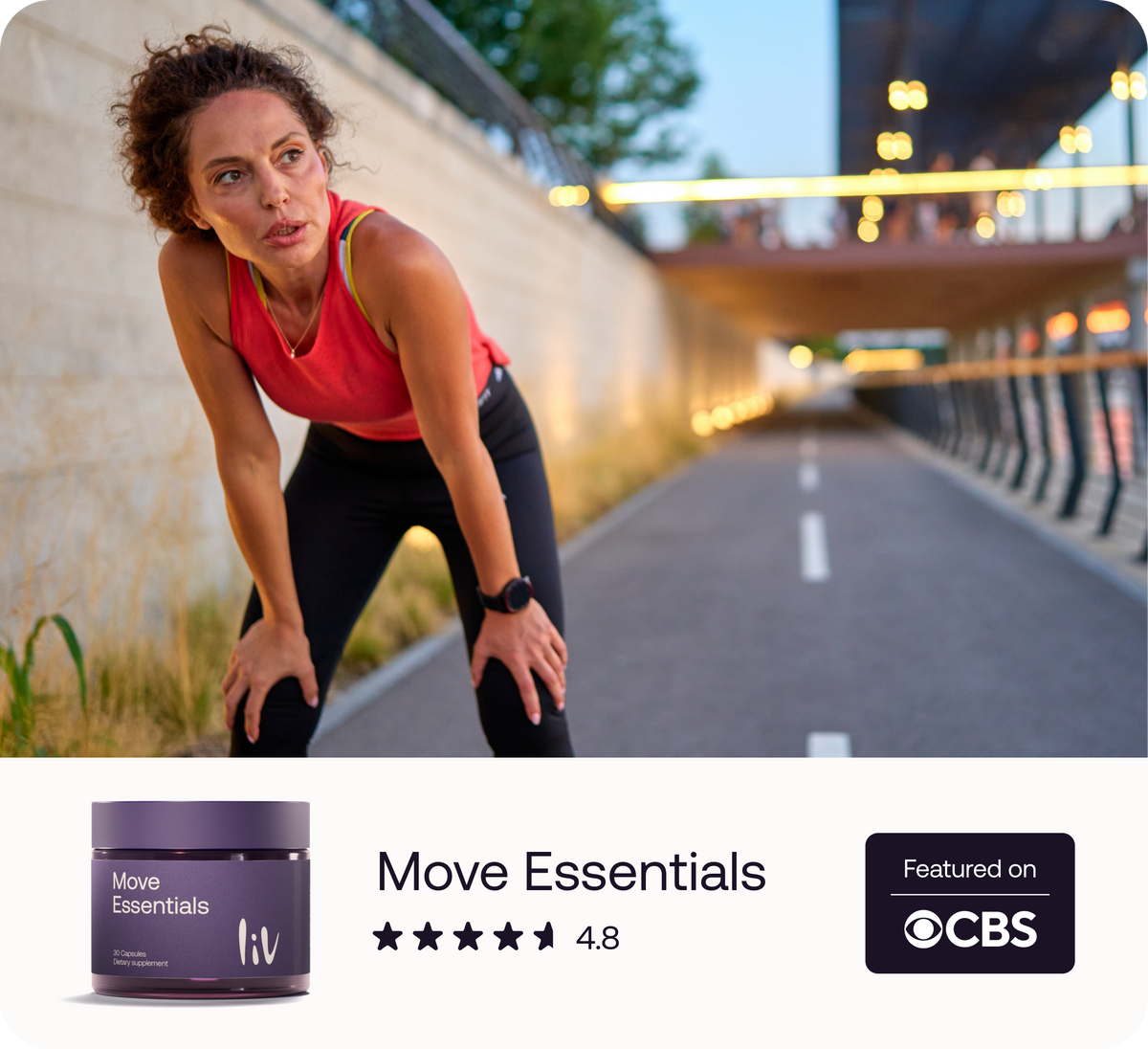 Woman in athletic wear on a road with 'Move Essentials' product and CBS logo.