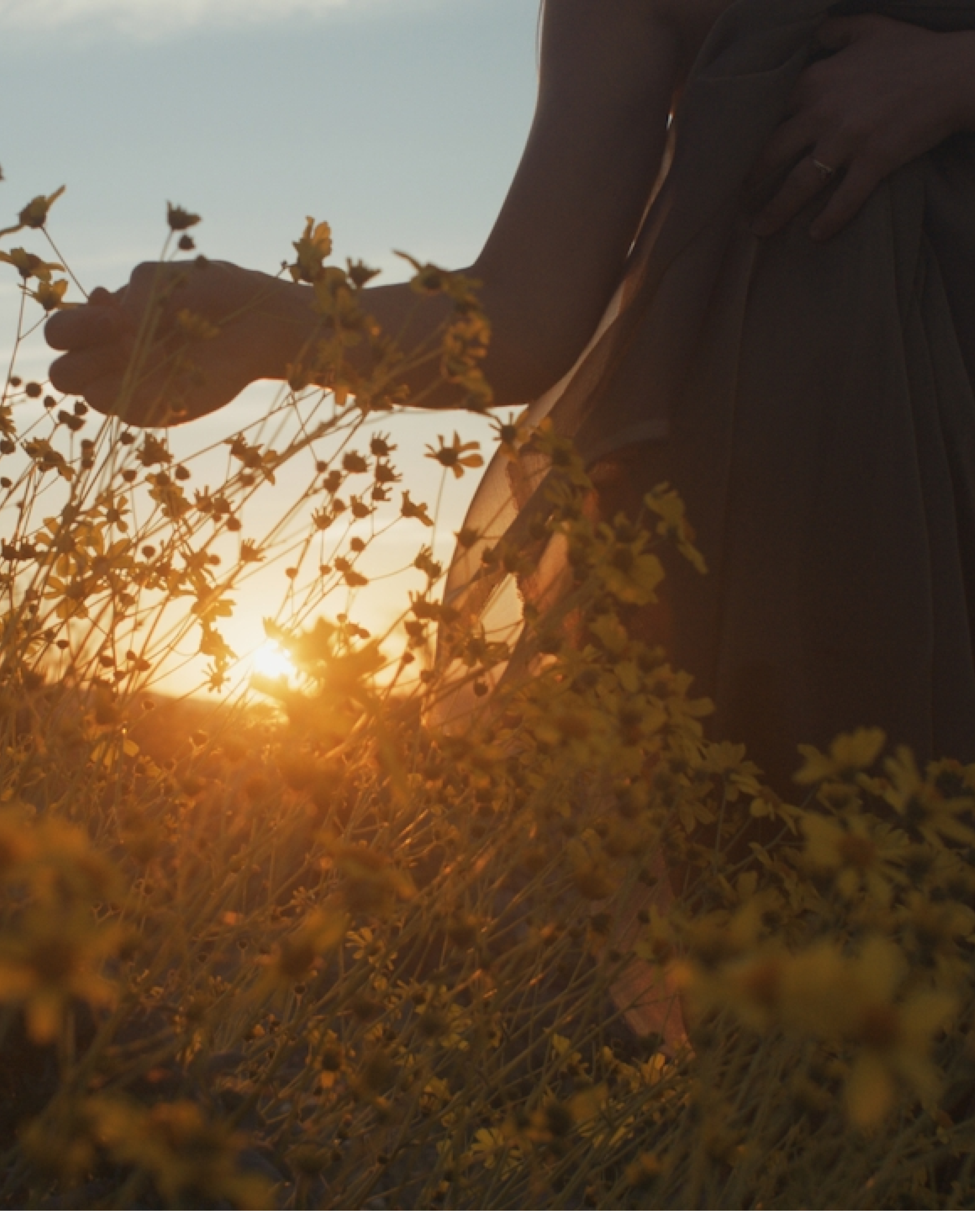 Woman walking in flowers