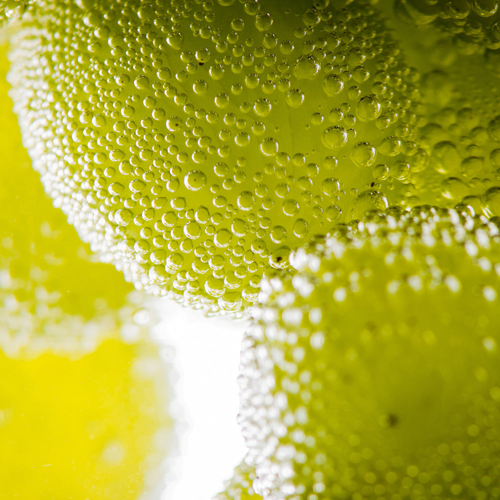 Close-up of bubbles in a green liquid